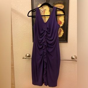 Purple dress with front ruffles. Never worn, size 10…